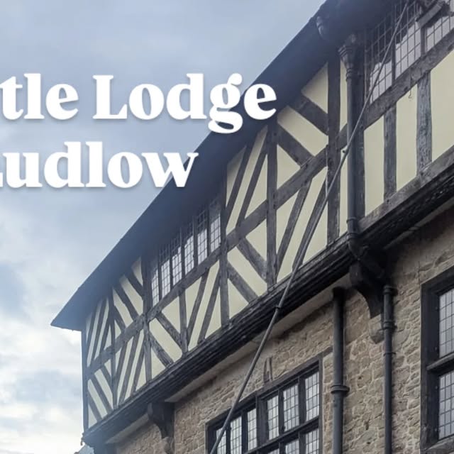 Water-fed pole against the timber-framed Castle Lodge in Ludlow